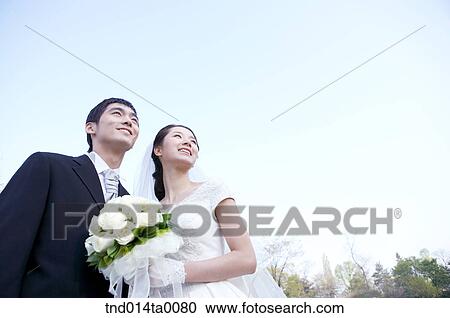 Stock Image - Wedding, a bridegroom and a bride. Fotosearch
