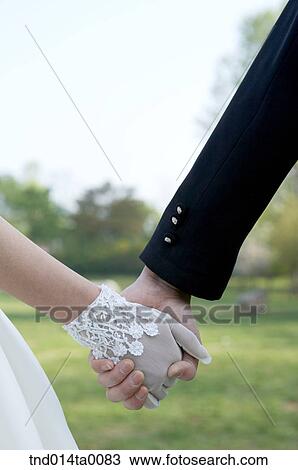 Stock Image - Wedding, a bridegroom and a bride. Fotosearch