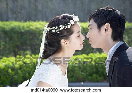Stock Image - Wedding, a bridegroom and a bride. Fotosearch