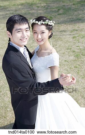 Stock Image - Wedding, a bridegroom and a bride. Fotosearch