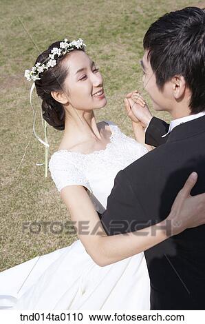 Stock Image - Wedding, a bridegroom and a bride. Fotosearch