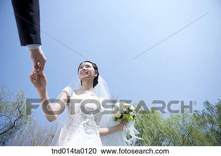 Wedding, a bridegroom and a bride View Large Photo Image Stock Image - Wedding, a bridegroom and a bride. Fotosearch