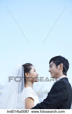 Stock Photo - Wedding, a bridegroom and a bride. Fotosearch