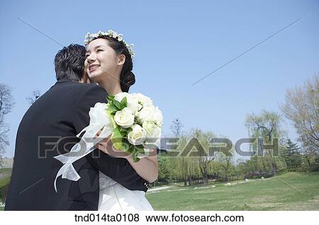 Stock Photo - Wedding, a bridegroom and a bride. Fotosearch