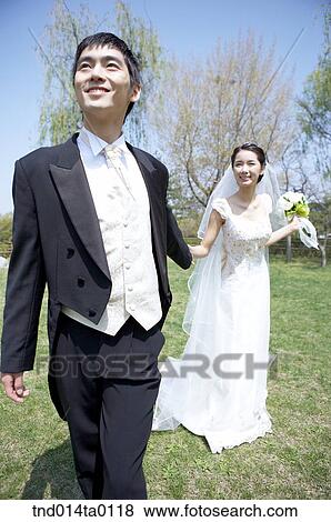 Stock Photo - Wedding, a bridegroom and a bride. Fotosearch