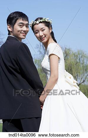 Wedding, a bridegroom and a bride View Large Photo Image Stock Photograph - Wedding, a bridegroom and a bride. Fotosearch