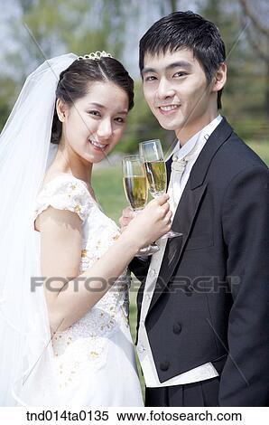 Stock Photography - Wedding, a bridegroom and a bride. Fotosearch