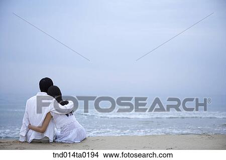 couple hug on the seashore View Large Photo Image Picture - couple hug on the seashore. Fotosearch