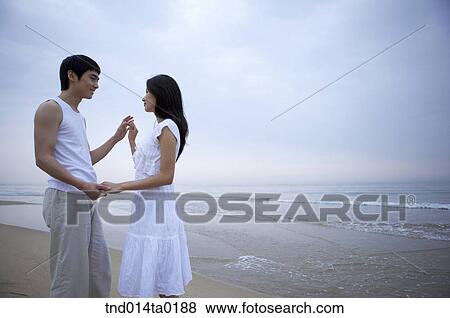 honeymoon, trip, seashore?? facing each other couple View Large Photo Image Stock Photo - honeymoon, trip, seashore?? facing each other couple. Fotosearch