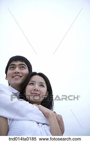 hugging couple on the seashore View Large Photo Image Stock Photography - hugging couple on the seashore. Fotosearch