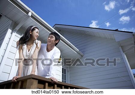 Newly married couple chat with smile View Large Photo Image Stock Image - Newly married couple chat with smile. Fotosearch