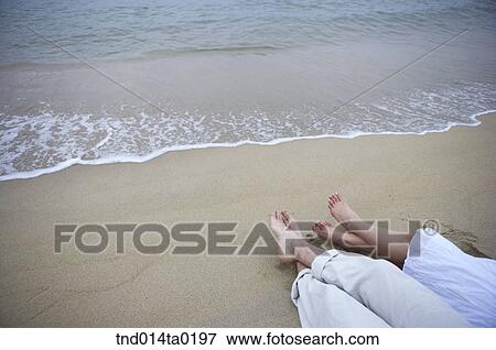 wave and tides, bare foot of couple View Large Photo Image Stock Photo - wave and tides, bare foot of couple. Fotosearch