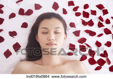 spa/ massage table? laying woman View Large Photo Image Picture - spa/ massage table? laying woman. Fotosearch