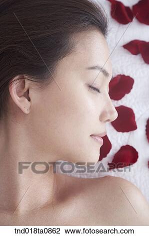 spa/ massage table? laying woman View Large Photo Image Stock Image - spa/ massage table? laying woman. Fotosearch