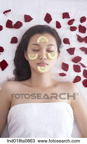 spa/ massage table? laying woman View Large Photo Image Stock Image - spa/ massage table? laying woman. Fotosearch