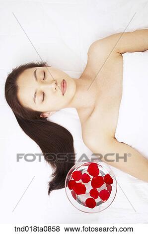 spa/ massage table? laying woman View Large Photo Image Stock Photo - spa/ massage table? laying woman. Fotosearch