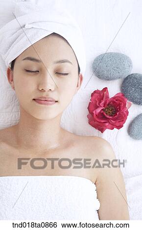 spa/ massage table? laying woman View Large Photo Image Stock Photograph - spa/ massage table? laying woman. Fotosearch