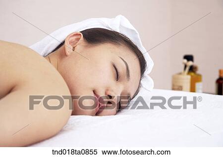 spa/ massage table? lying prone woman View Large Photo Image Stock Photography - spa/ massage table? lying prone woman. Fotosearch