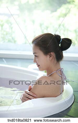 woman doing bath View Large Photo Image Stock Image - woman doing bath. Fotosearch