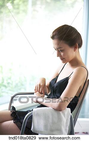 woman sitting on the chair View Large Photo Image Stock Photo - woman sitting on the chair. Fotosearch