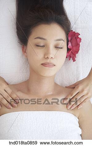 woman taking massage from massagist View Large Photo Image Stock Photo - woman taking massage from massagist. Fotosearch