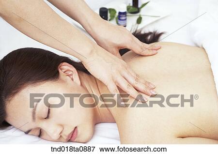 woman taking massage from massagist View Large Photo Image Stock Photo - woman taking massage from massagist. Fotosearch