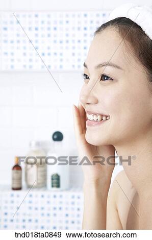 woman touching her skin View Large Photo Image Stock Photo - woman touching her skin. Fotosearch