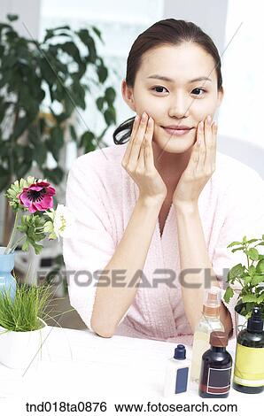 woman touching her skin View Large Photo Image Stock Photograph - woman touching her skin. Fotosearch