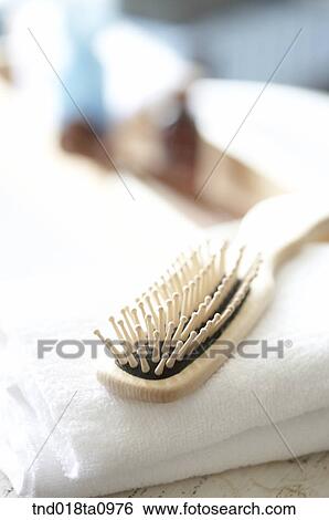 Stock Photograph - aroma theraphy, towel and comb. Fotosearch