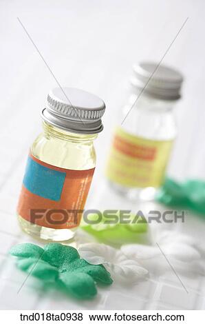 Stock Photo - aroma theraphym oil and bottle. Fotosearch