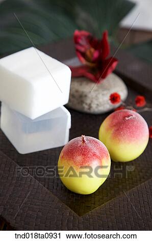Stock Image - soap and incensed candle for aroma theraphye. Fotosearch