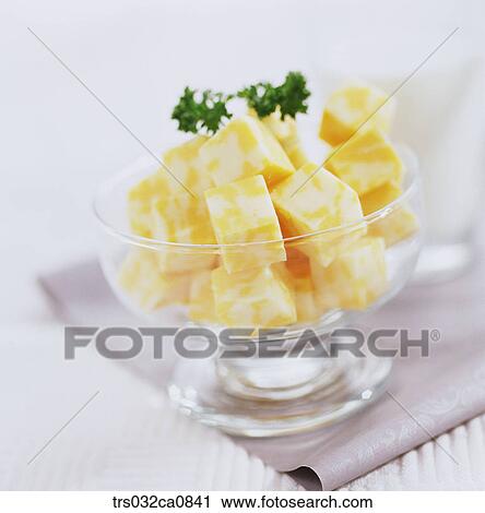 Stock Image - dairy products, food, cheese, Cheddar, closeup. Fotosearch