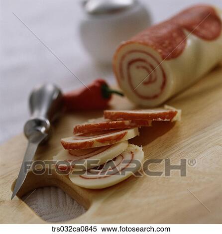 Stock Photography - dairy products, food, cheese, ham, slice, chopping board, knife. Fotosearch