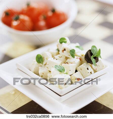Stock Photograph - dairy products, food, cheese, plate, dessert, closeup. Fotosearch