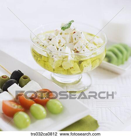 Stock Image - dairy products, food, cheese, salad, dessert, skewer, closeup. Fotosearch