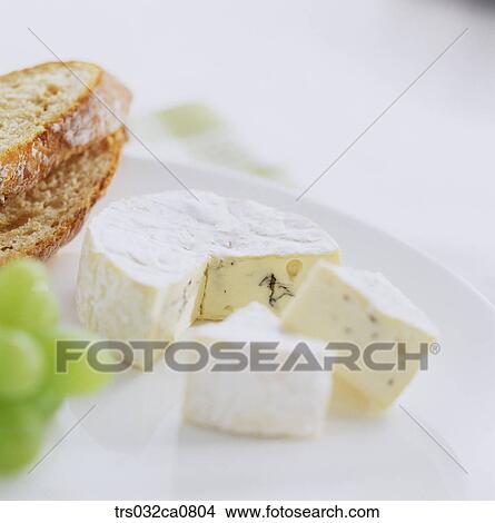 Picture - dairy products, food, cheese, slice, cream cheese, brie cheese, Camembert cheese. Fotosearch