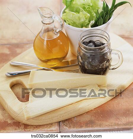 dairy products, food, cheese, slice, chopping board, olive, olive oil View Large Photo Image Picture - dairy products, food, cheese, slice, chopping board, olive, olive oil. Fotosearch