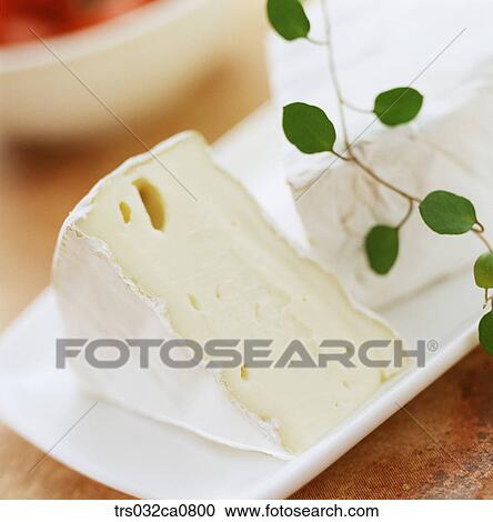 Stock Image - dairy products, food, cheese, slice, cream cheese, brie cheese, Camembert cheese. Fotosearch