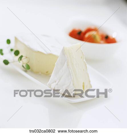 Stock Image - dairy products, food, cheese, slice, cream cheese, brie cheese, Camembert cheese. Fotosearch