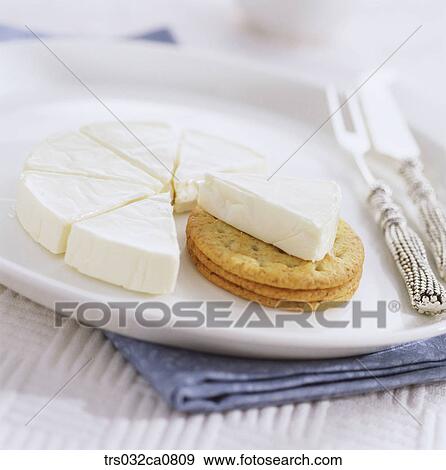 Stock Photo - dairy products, food, cheese, slice, cream cheese, brie cheese, Camembert cheese. Fotosearch
