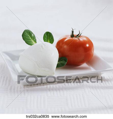 Stock Photography - dessert, food, tomato, cheese, plate, cream cheese, closeup. Fotosearch