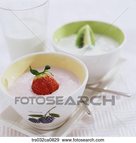 Stock Photo - dessert, food, yogurt, well-being, dairy products, strawberry, closeup. Fotosearch