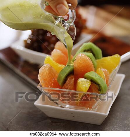dessert, food, tangerine, orange, kiwi, dressing, closeup View Large Photo Image Picture - dessert, food, tangerine, orange, kiwi, dressing, closeup. Fotosearch