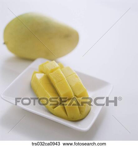 Stock Image - fruit, food, mango, closeup, piece. Fotosearch