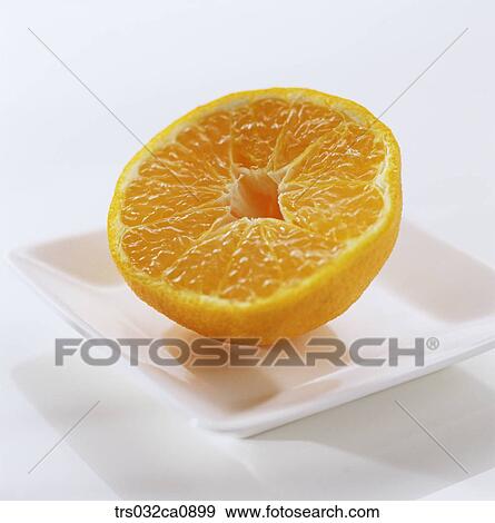 Stock Photo - fruit, food, orange, slice, closeup, tangerine. Fotosearch