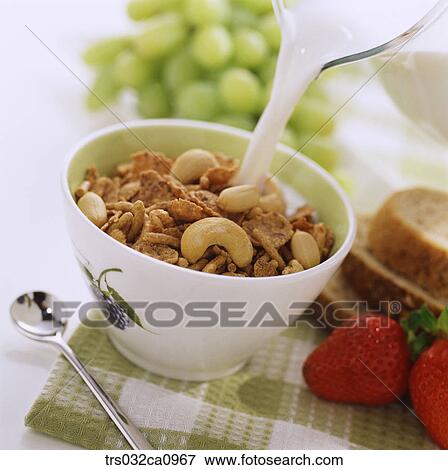 Stock Photo - breakfast, food, cereals, milk, closeup, nut. Fotosearch