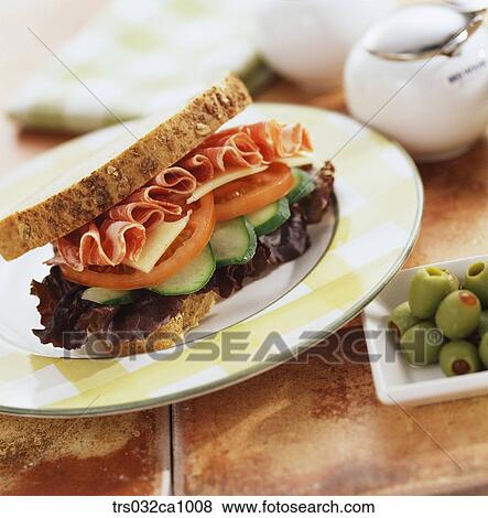 Stock Photo - fastfood, food, dish, sandwich, ham, cucumber, tomato. Fotosearch