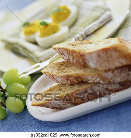 food, confectionery, bread, baguette, boiled egg, dessert, closeup View Large Photo Image Stock Photo - food, confectionery, bread, baguette, boiled egg, dessert, closeup. Fotosearch