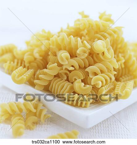Stock Image - food, food material, noodle, noodle, fusilli, plate, pasta. Fotosearch