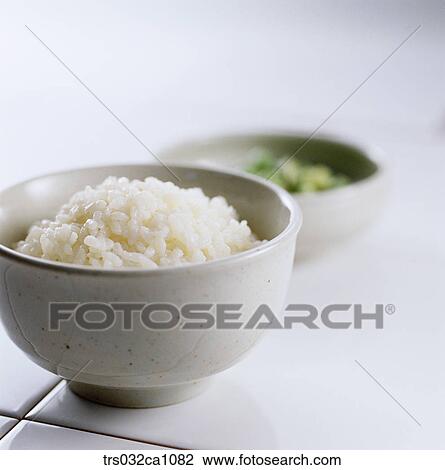 Stock Image - Korean dish, food, rice, steamed rice, bowl, closeup. Fotosearch